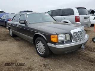 ✅ 1987 Mercedes-Benz 560 • VIN: WDBCA39D7HA322057 • Лот: 83717904. Опубликован ранее на Copart с пробегом 246 060 миль. Бесплатный доступ к архиву аукционных продаж из США и подробный отчёт об истории автомобиля на DreamBid. Изображение 4.