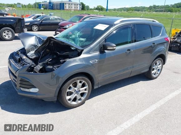✅ 2015 Ford Escape Titanium • VIN: 1FMCU9J92FUB01007 • Lot: 42319246. Listed on IAAI with 90,782 mi. Free auction sales archive from the USA and detailed vehicle history report at DreamBid. Image 2.