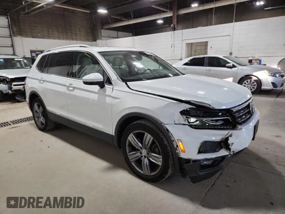 ✅ 2019 Volkswagen Tiguan SEL Premium • VIN: 3VV4B7AX6KM155721 • Лот: 91967615. Опубликован ранее на Copart с пробегом 98 630 миль. Бесплатный доступ к архиву аукционных продаж из США и подробный отчёт об истории автомобиля на DreamBid. Изображение 4.