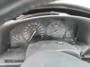 ✅ 2001 Saturn SC • VIN: 1G8ZY12771Z327700 • Лот: 69036975. Опубликован ранее на Copart с пробегом Не указан. Бесплатный доступ к архиву аукционных продаж из США и подробный отчёт об истории автомобиля на DreamBid. Изображение 9.