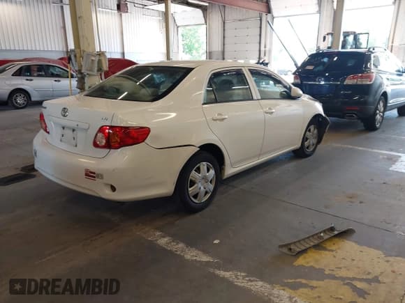 ✅ 2010 Toyota Corolla • VIN: 1NXBU4EE5AZ284210 • Lot: 42334607. Listed on IAAI with 105,246 mi. Free auction sales archive from the USA and detailed vehicle history report at DreamBid. Image 4.