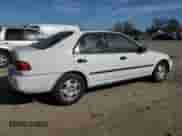 1995 Honda Civic with VIN JHMEG8558SS016327, listed as a Copart auction lot 74427004 with 153,248 mi miles and Salvage title. Bid and sale history available at DreamBid. Image 3.