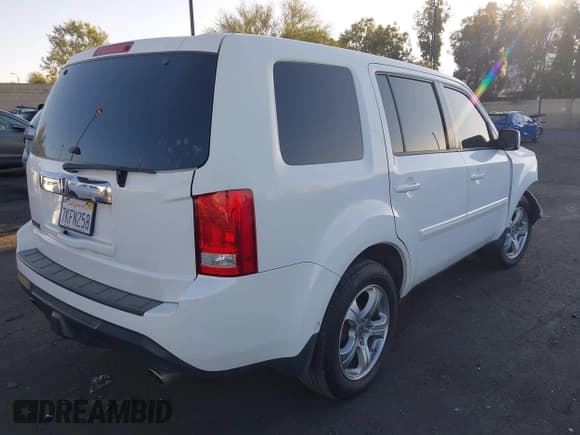 ✅ 2015 Honda Pilot EX-L • VIN: 5FNYF3H74FB025689 • Lot: 42665413. Listed on IAAI with 152,622 mi. Free auction sales archive from the USA and detailed vehicle history report at DreamBid. Image 4.
