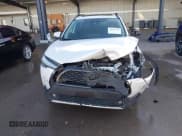 ✅ 2023 Toyota Corolla Cross XLE • VIN: 7MUDAABG8PV059602 • Лот: 43609232. Опубликован ранее на IAAI с пробегом 41 945 миль. Бесплатный доступ к архиву аукционных продаж из США и подробный отчёт об истории автомобиля на DreamBid. Изображение 13.