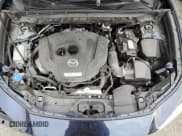 ✅ 2022 Mazda CX-30 2.5 Turbo • VIN: 3MVDMBAY5NM447836 • Lot: 87030384. Listed on Copart with 38,008 mi. Free auction sales archive from the USA and detailed vehicle history report at DreamBid. Image 12.