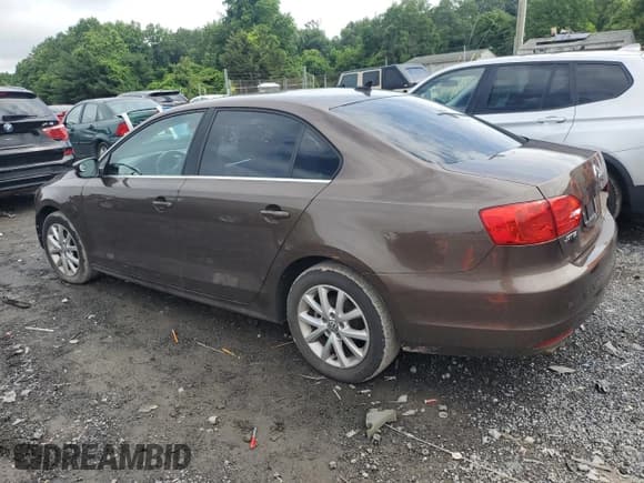 ✅ 2013 Volkswagen Jetta SE • VIN: 3VWDP7AJ8DM431330 • Lot: 56738795. Listed on Copart with 114,151 mi. Free auction sales archive from the USA and detailed vehicle history report at DreamBid. Image 2.