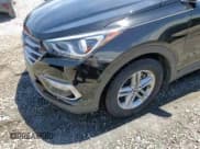 ✅ 2018 Hyundai Santa Fe 2.4L • VIN: 5XYZU3LB1JG529527 • Лот: 63758023. Опубликован ранее на Copart с пробегом 79 833 миль. Бесплатный доступ к архиву аукционных продаж из США и подробный отчёт об истории автомобиля на DreamBid. Изображение 11.