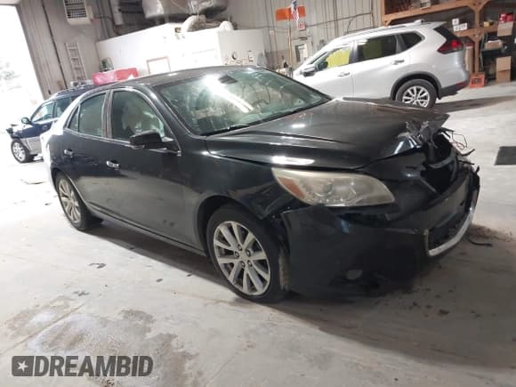 ✅ 2014 Chevrolet Malibu LTZ • VIN: 1G11H5SL7EF132977 • Lot: 43489929. Listed on IAAI with 144,561 mi. Free auction sales archive from the USA and detailed vehicle history report at DreamBid. Image 1.