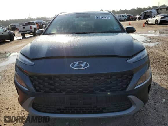 2022 Hyundai Kona SEL z VIN KM8K62AB6NU895069, wystawiony jako Copart lot #52220863 z przebiegiem 11 484 mil mil oraz . Historia ofert i sprzedaży dostępna na DreamBid. Obrazek 5.