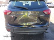 ✅ 2014 Mazda CX-5 Sport • VIN: JM3KE2BE0E0339810 • Lot: 43657362. Listed on IAAI with 198,849 mi. Free auction sales archive from the USA and detailed vehicle history report at DreamBid. Image 6.