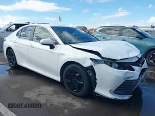 2021 Toyota Camry Hybrid LE z VIN 4T1C31AK8MU030335, wystawiony jako IAAI lot #43438433 z przebiegiem 79 774 mil mil oraz . Historia ofert i sprzedaży dostępna na DreamBid. Obrazek 1.
