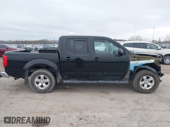 ✅ 2013 Nissan Frontier SV • VIN: 1N6AD0EV2DN738854 • Lot: 41959311. Listed on IAAI with 151,960 mi. Free auction sales archive from the USA and detailed vehicle history report at DreamBid. Image 14.