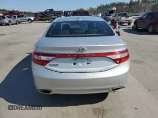 2014 Hyundai Azera с VIN KMHFG4JG9EA340818, выставлен на аукционе Copart как лот 47789005 с пробегом 91 317 миль миль и Списание • Salvage title. История ставок и продаж доступна на DreamBid. Изображение 6.