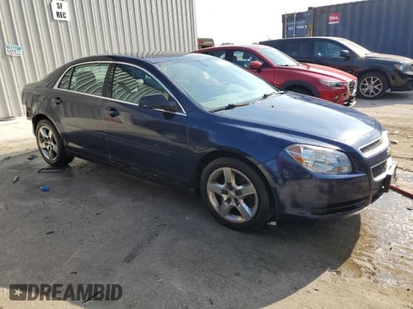 ✅ 2011 Chevrolet Malibu 1LS • VIN: 1G1ZB5E13BF148250 • Lot: 68666464. Listed on Copart with 141,732 mi. Free auction sales archive from the USA and detailed vehicle history report at DreamBid. Image 4.