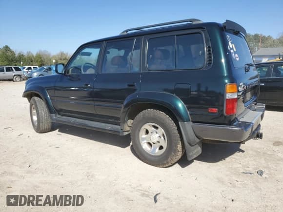 ✅ 1995 Toyota Land Cruiser • VIN: JT3DJ81W6S0106332 • Lot: 47772055. Listed on Copart with 214,499 mi. Free auction sales archive from the USA and detailed vehicle history report at DreamBid. Image 2.