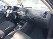 ✅ 2014 Volkswagen Tiguan S • VIN: WVGAV3AX2EW598630 • Лот: 43627293. Опубликован ранее на IAAI с пробегом 103 907 миль. Бесплатный доступ к архиву аукционных продаж из США и подробный отчёт об истории автомобиля на DreamBid. Изображение 5.