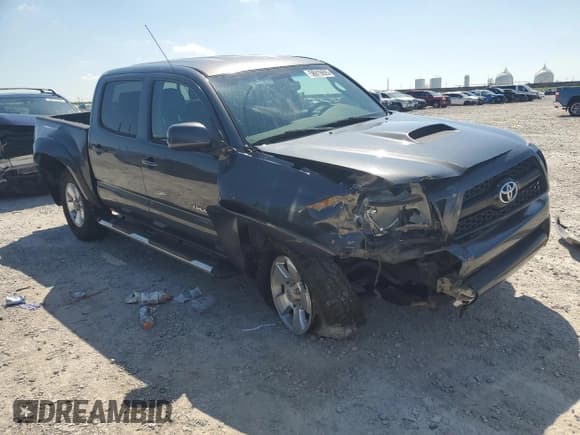 ✅ 2011 Toyota Tacoma • VIN: 5TFLU4EN4BX006729 • Lot: 56919605. Listed on Copart with 392,495 mi. Free auction sales archive from the USA and detailed vehicle history report at DreamBid. Image 4.