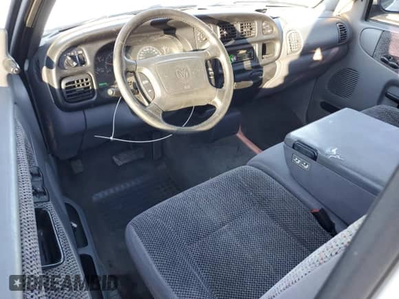 2001 Dodge 1500 с VIN 1B7HC16Y71S161058, выставлен на аукционе Copart как лот 82820584 с пробегом 260 446 миль миль и Списание • Salvage title. История ставок и продаж доступна на DreamBid. Изображение 8.