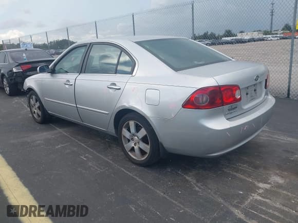 ✅ 2007 Kia Optima LX • VIN: KNAGE123075154280 • Lot: 43322468. Listed on IAAI with 220,638 mi. Free auction sales archive from the USA and detailed vehicle history report at DreamBid. Image 3.