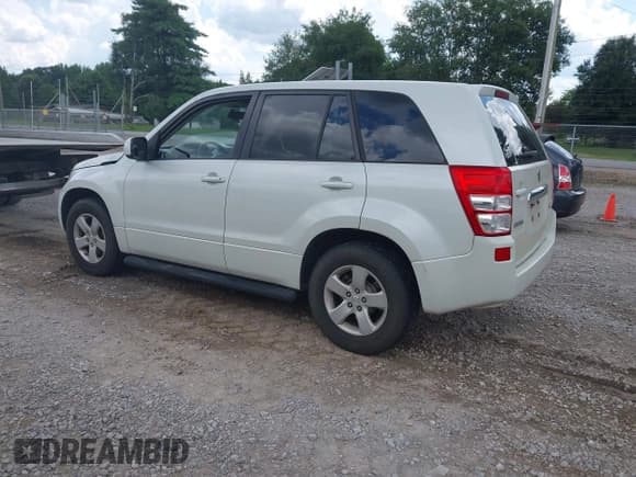 ✅ 2013 Suzuki Grand Vitara Premium • VIN: JS3TE0D68D4100201 • Lot: 42694457. Listed on IAAI with 126,585 mi. Free auction sales archive from the USA and detailed vehicle history report at DreamBid. Image 3.