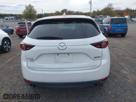 ✅ 2021 Mazda CX-5 Touring • VIN: JM3KFBCM8M0417025 • Lot: 43521796. Wystawiony na IAAI z przebiegiem 44 218 mil. Bezpłatny archiwum sprzedaży aukcyjnych z USA i szczegółowy raport historii pojazdu na DreamBid. Zdjęcie 17.