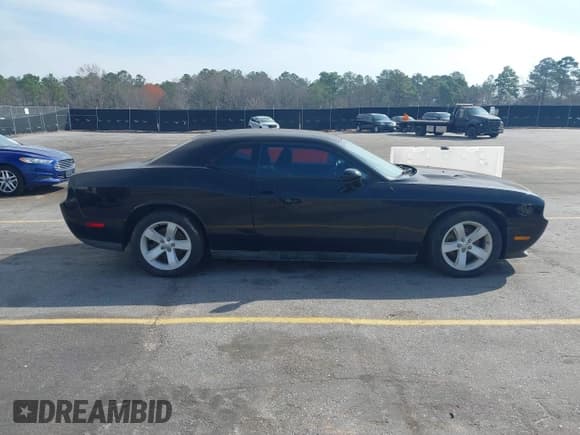 ✅ 2013 Dodge Challenger Rallye Redline • VIN: 2C3CDYAG3DH517925 • Lot: 41774052. Wystawiony na IAAI z przebiegiem 151 207 mil. Bezpłatny archiwum sprzedaży aukcyjnych z USA i szczegółowy raport historii pojazdu na DreamBid. Zdjęcie 13.