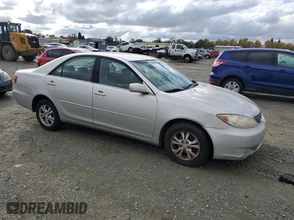 ✅ 2005 Toyota Camry LE • VIN: 4T1BF30K05U592215 • Lot: 92641265. Listed on Copart with 285,482 mi. Free auction sales archive from the USA and detailed vehicle history report at DreamBid. Image 4.