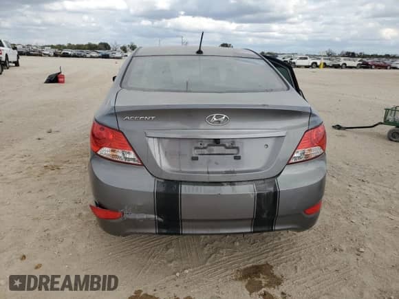 2014 Hyundai Accent GLS with VIN KMHCT4AE2EU749318, listed as a Copart auction lot 90110275 with Not provided miles and Salvage title. Bid and sale history available at DreamBid. Image 6.