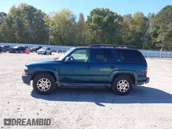 2006 Chevrolet Tahoe LS z VIN 1GNEC13Z16R157867, wystawiony jako IAAI lot #43426064 z przebiegiem 202 744 mil mil oraz . Historia ofert i sprzedaży dostępna na DreamBid. Obrazek 14.