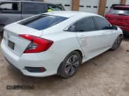 ✅ 2017 Honda Civic EX-L • VIN: 19XFC1F71HE014195 • Lot: 42377598. Listed on IAAI with 165,600 mi. Free auction sales archive from the USA and detailed vehicle history report at DreamBid. Image 4.