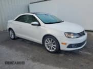 ✅ 2012 Volkswagen Eos Komfort • VIN: WVWBW7AH7CV021617 • Лот: 63940455. Опубликован ранее на Copart с пробегом 115 987 миль. Бесплатный доступ к архиву аукционных продаж из США и подробный отчёт об истории автомобиля на DreamBid. Изображение 4.