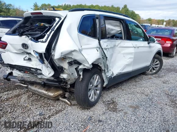 ✅ 2018 Volkswagen Tiguan SEL • VIN: 3VV2B7AX4JM071743 • Лот: 43466984. Опубликован ранее на IAAI с пробегом 90 095 миль. Бесплатный доступ к архиву аукционных продаж из США и подробный отчёт об истории автомобиля на DreamBid. Изображение 4.