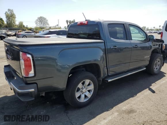 ✅ 2015 GMC Canyon 2WD SLE • VIN: 1GTG5BE30F1147999 • Лот: 54367455. Опубликован ранее на Copart с пробегом 152 231 миль. Бесплатный доступ к архиву аукционных продаж из США и подробный отчёт об истории автомобиля на DreamBid. Изображение 3.