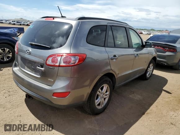 ✅ 2012 Hyundai Santa Fe GLS • VIN: 5XYZGDAB5CG130803 • Лот: 68308744. Опубликован ранее на Copart с пробегом 123 729 миль. Бесплатный доступ к архиву аукционных продаж из США и подробный отчёт об истории автомобиля на DreamBid. Изображение 3.