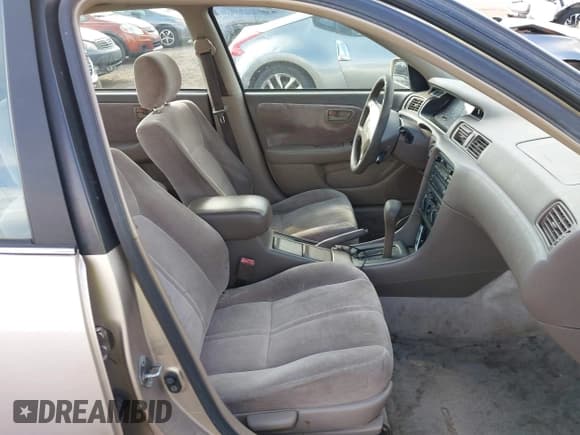 ✅ 1998 Toyota Camry LE • VIN: JT2BG22K0W0159455 • Лот: 43422047. Опубликован ранее на IAAI с пробегом 259 327 миль. Бесплатный доступ к архиву аукционных продаж из США и подробный отчёт об истории автомобиля на DreamBid. Изображение 5.