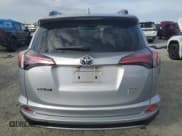 ✅ 2018 Toyota RAV4 XLE • VIN: 2T3RFREV7JW750913 • Лот: 82642695. Опубликован ранее на Copart с пробегом 88 010 миль. Бесплатный доступ к архиву аукционных продаж из США и подробный отчёт об истории автомобиля на DreamBid. Изображение 6.