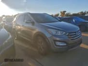✅ 2015 Hyundai Santa Fe • VIN: 5XYZU3LB7FG274910 • Лот: 91034995. Опубликован ранее на Copart с пробегом 163 728 миль. Бесплатный доступ к архиву аукционных продаж из США и подробный отчёт об истории автомобиля на DreamBid. Изображение 4.