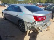 ✅ 2014 Chevrolet Malibu LTZ • VIN: 1G11H5SL6EF117001 • Lot: 43325344. Listed on IAAI with 183,202 mi. Free auction sales archive from the USA and detailed vehicle history report at DreamBid. Image 3.