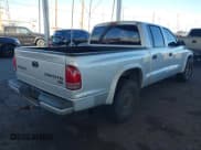 ✅ 2003 Dodge Dakota SLT • VIN: 1D7HL48N13S294573 • Lot: 41291127. Wystawiony na IAAI z przebiegiem 227 355 mil. Bezpłatny archiwum sprzedaży aukcyjnych z USA i szczegółowy raport historii pojazdu na DreamBid. Zdjęcie 4.