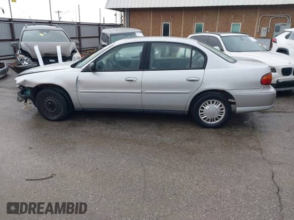 2003 Chevrolet Malibu z VIN 1G1ND52J43M508250, wystawiony jako IAAI lot #40873922 z przebiegiem 217 980 mil mil oraz . Historia ofert i sprzedaży dostępna na DreamBid. Obrazek 15.