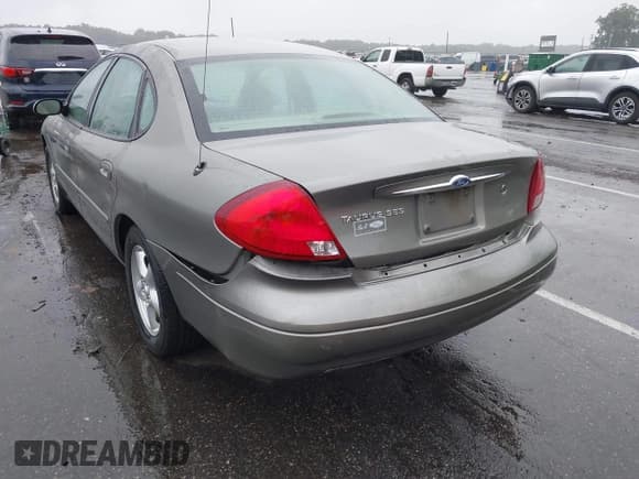 ✅ 2002 Ford Taurus SES Standard • VIN: 1FAFP55U12G230323 • Лот: 43027316. Опубликован ранее на IAAI с пробегом 78 495 миль. Бесплатный доступ к архиву аукционных продаж из США и подробный отчёт об истории автомобиля на DreamBid. Изображение 6.