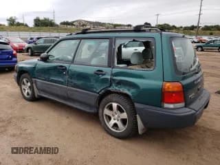 ✅ 1999 Subaru Forester L • VIN: JF1SF635XXH750203 • Lot: 71791114. Listed on Copart with 87,015 mi. Free auction sales archive from the USA and detailed vehicle history report at DreamBid. Image 2.