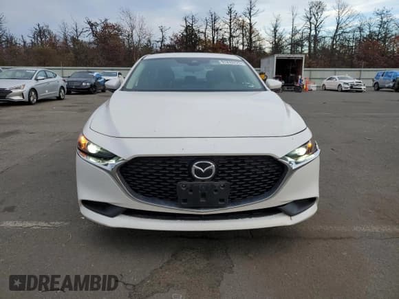 ✅ 2022 Mazda 3 Select • VIN: 3MZBPABL1NM309494 • Лот: 91249725. Опубликован ранее на Copart с пробегом 24 759 миль. Бесплатный доступ к архиву аукционных продаж из США и подробный отчёт об истории автомобиля на DreamBid. Изображение 5.