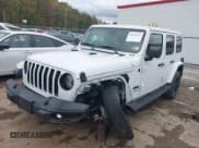 ✅ 2020 Jeep Wrangler Unlimited Sahara • VIN: 1C4HJXEG5LW266954 • Lot: 43428653. Listed on IAAI with 57,578 mi. Free auction sales archive from the USA and detailed vehicle history report at DreamBid. Image 17.
