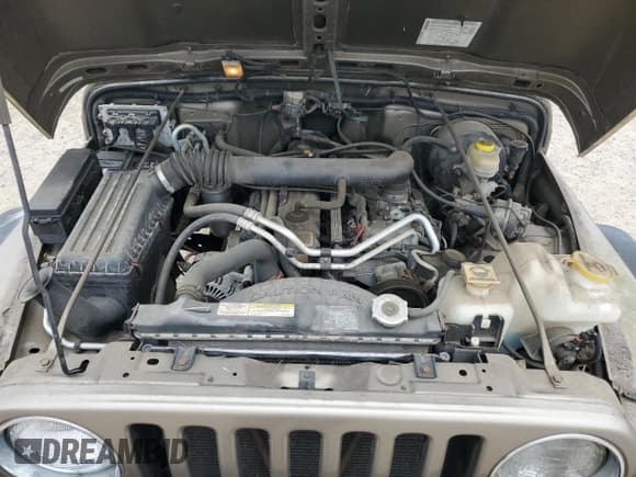 ✅ 2004 Jeep Wrangler Rubicon • VIN: 1J4FA69S34P756394 • Lot: 86123855. Wystawiony na Copart z przebiegiem 62 500 mil. Bezpłatny archiwum sprzedaży aukcyjnych z USA i szczegółowy raport historii pojazdu na DreamBid. Zdjęcie 11.