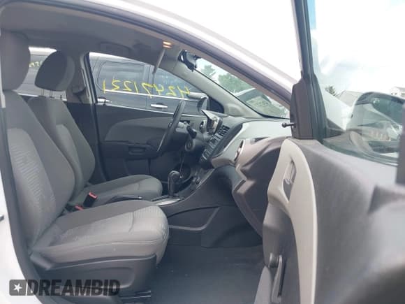 ✅ 2016 Chevrolet Sonic LS • VIN: 1G1JA5SH3G4120520 • Lot: 42471221. Listed on IAAI with 61,637 mi. Free auction sales archive from the USA and detailed vehicle history report at DreamBid. Image 5.