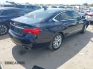 ✅ 2018 Chevrolet Impala Premier • VIN: 1G1125S31JU128768 • Lot: 43371673. Listed on IAAI with 104,013 mi. Free auction sales archive from the USA and detailed vehicle history report at DreamBid. Image 4.