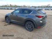 ✅ 2018 Mazda CX-5 Touring • VIN: JM3KFBCM3J0398105 • Lot: 43609194. Wystawiony na IAAI z przebiegiem 64 706 mil. Bezpłatny archiwum sprzedaży aukcyjnych z USA i szczegółowy raport historii pojazdu na DreamBid. Zdjęcie 3.