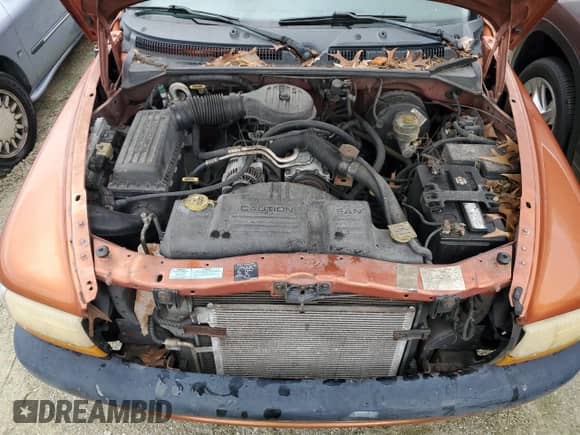 2000 Dodge Dakota z VIN 1B7GL22X0YS648773, wystawiony jako Copart lot #73998694 z przebiegiem 105 897 mil mil oraz Czysty tytuł • Clean title. Historia ofert i sprzedaży dostępna na DreamBid. Obrazek 11.