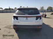 ✅ 2022 Hyundai Tucson Blue • VIN: KM8JBCA19NU063424 • Lot: 73437974. Wystawiony na Copart z przebiegiem 42 011 mil. Bezpłatny archiwum sprzedaży aukcyjnych z USA i szczegółowy raport historii pojazdu na DreamBid. Zdjęcie 6.